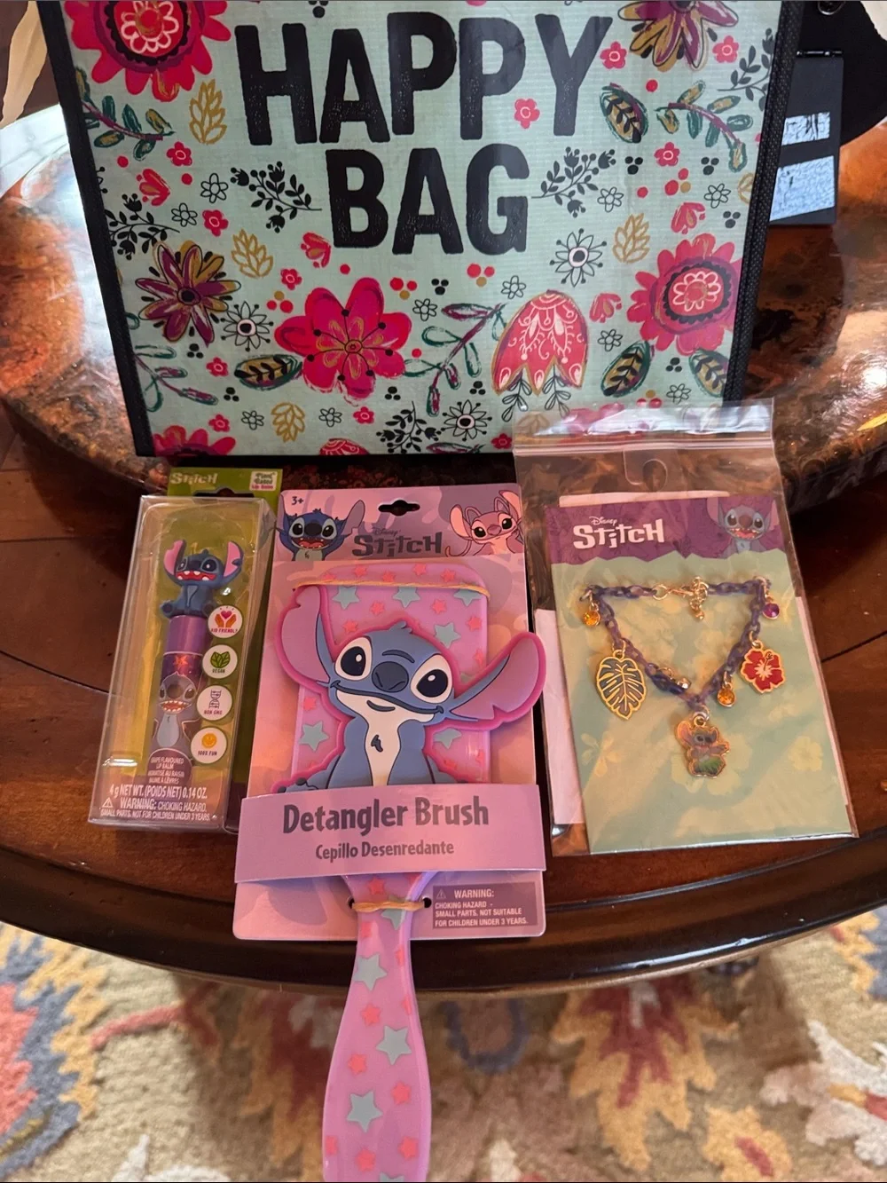 Disney Stitch Detangler Brush, Charm Bracelet, lip balm & Bag